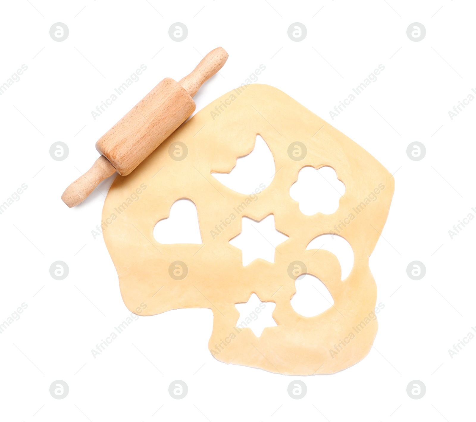 Photo of Raw dough and wooden rolling pin isolated on white, top view