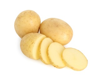 Fresh whole and cut potatoes isolated on white