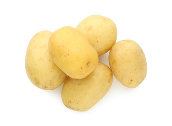 Photo of Pile of young fresh potatoes isolated on white, top view