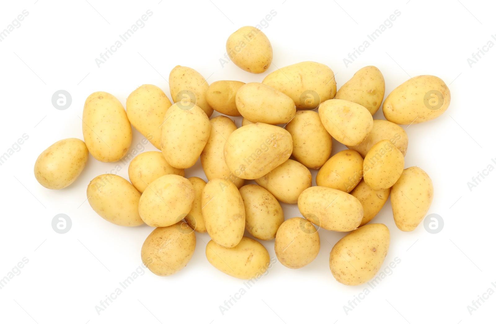 Photo of Pile of fresh young potatoes isolated on white, top view