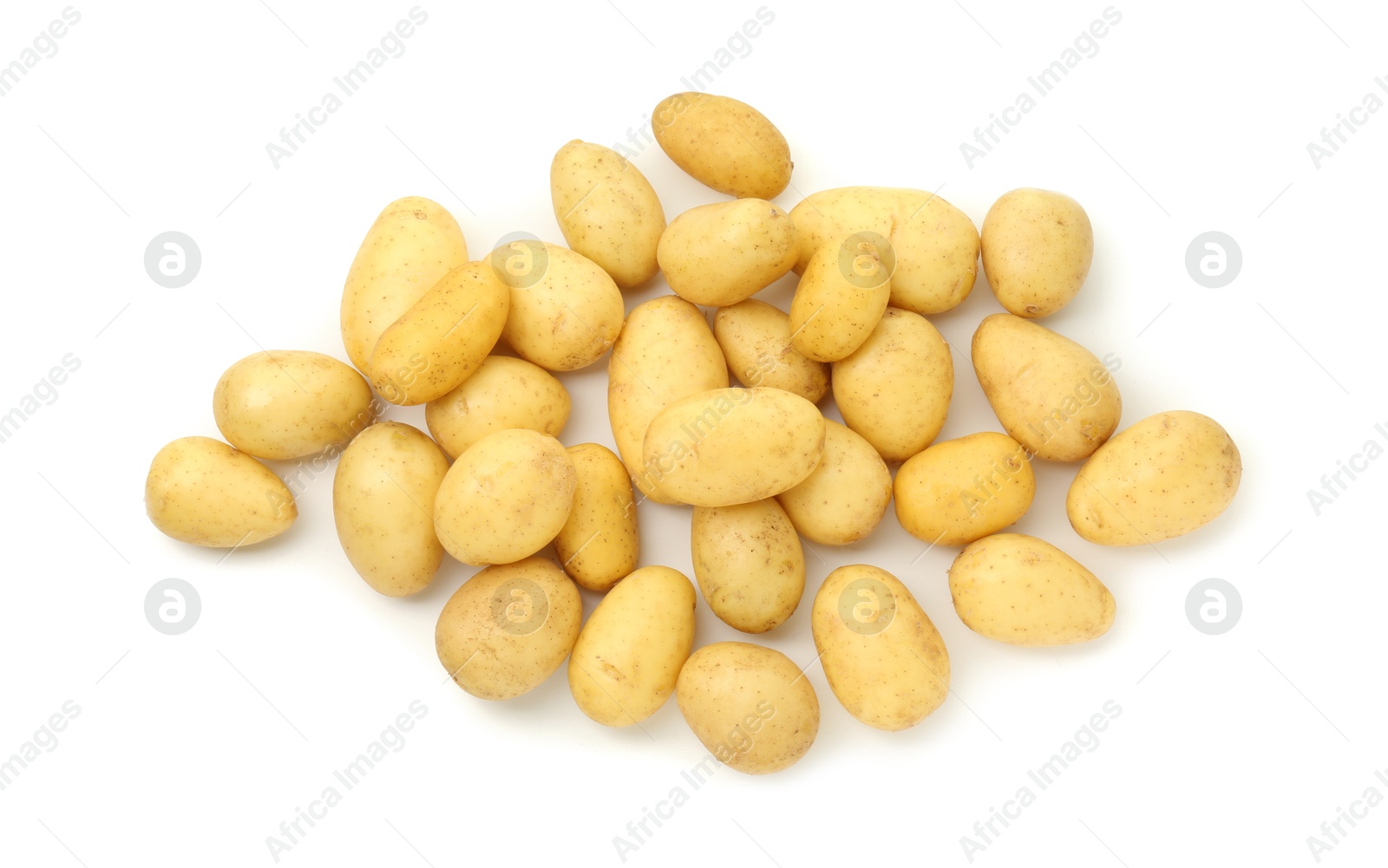 Photo of Pile of fresh young potatoes isolated on white, top view