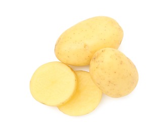 Photo of Fresh whole and cut potatoes isolated on white, top view