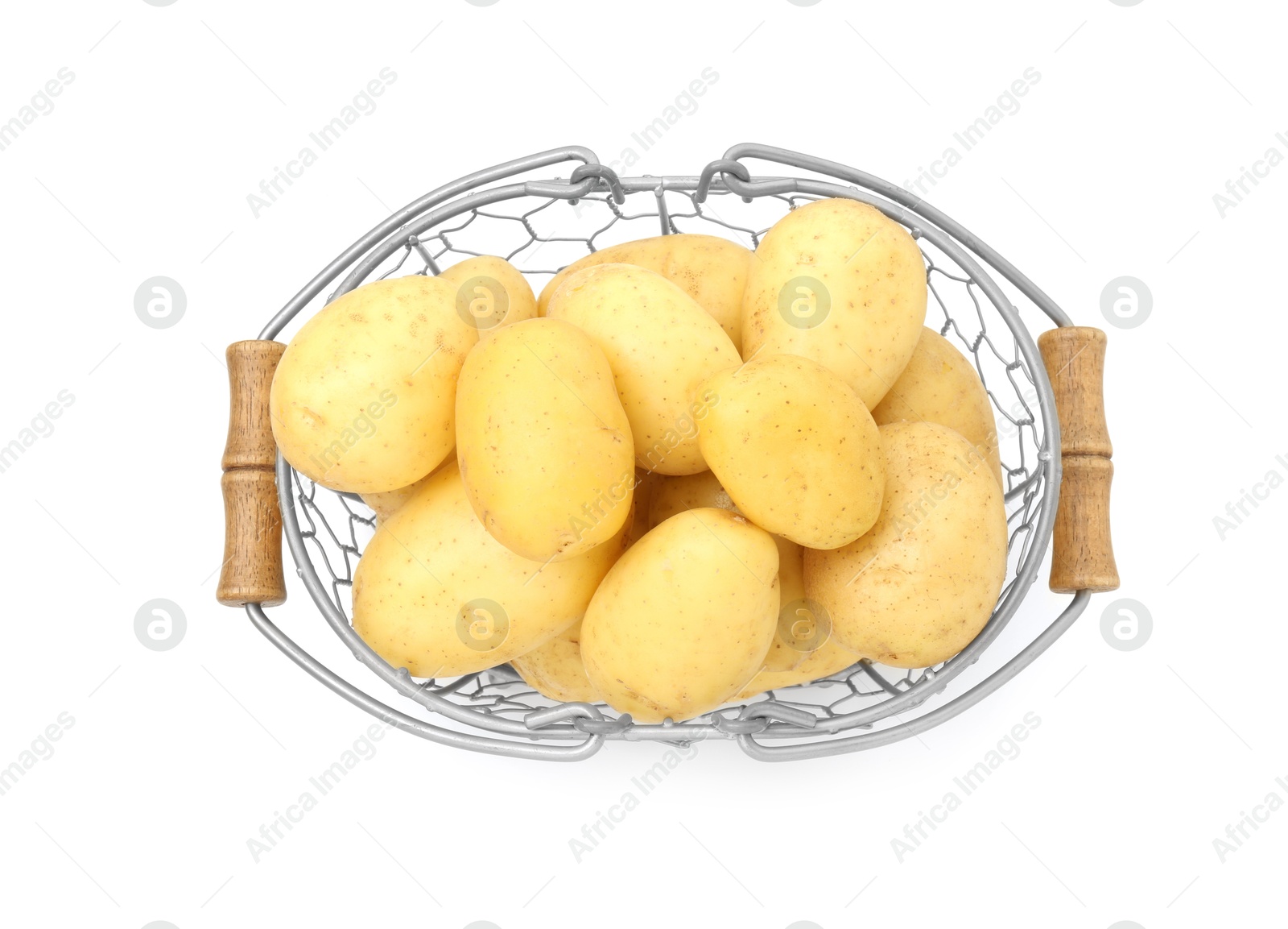 Photo of Young potatoes in metal basket isolated on white, top view