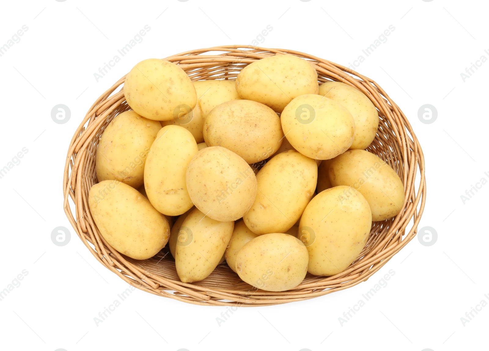 Photo of Young potatoes in wicker basket isolated on white, top view