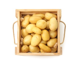 Photo of Young potatoes in wooden crate isolated on white, top view