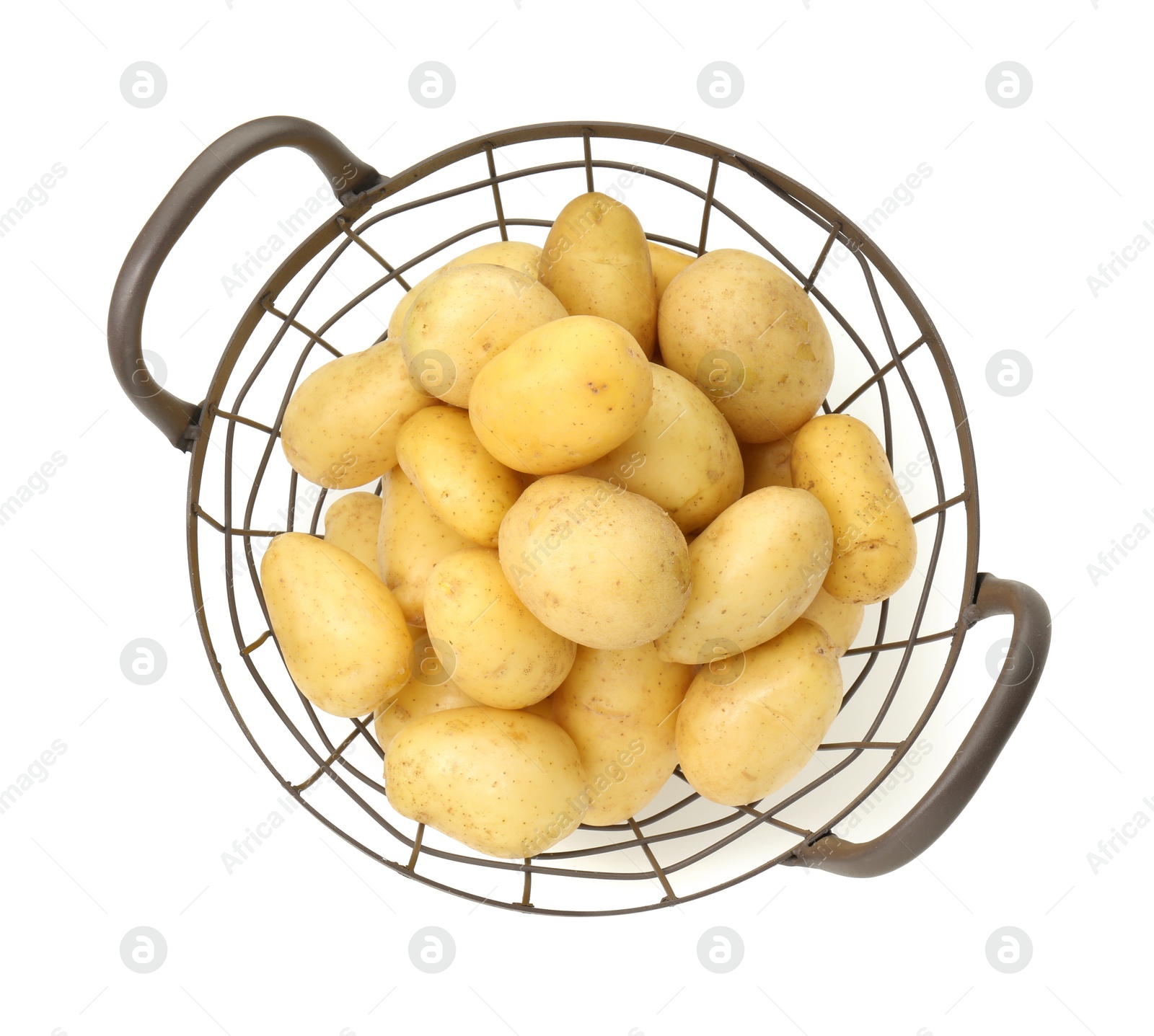 Photo of Young potatoes in metal basket isolated on white, top view