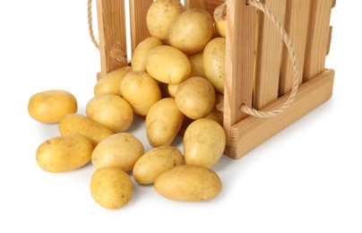 Photo of Young potatoes in wooden crate isolated on white