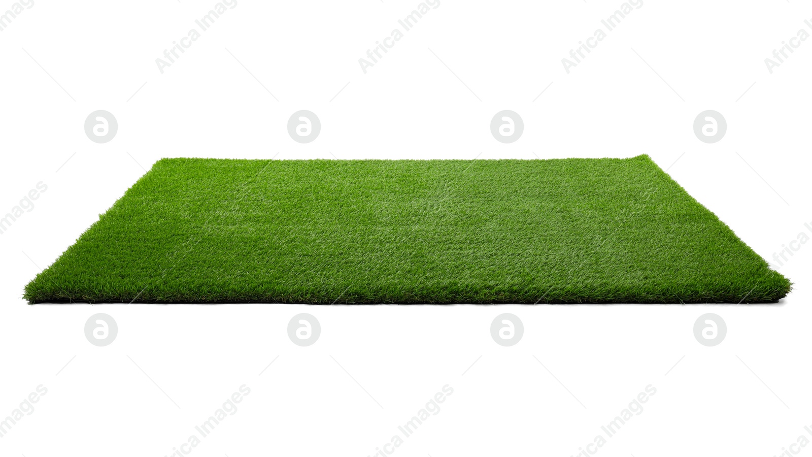 Photo of Green artificial grass isolated on white. Garden decor