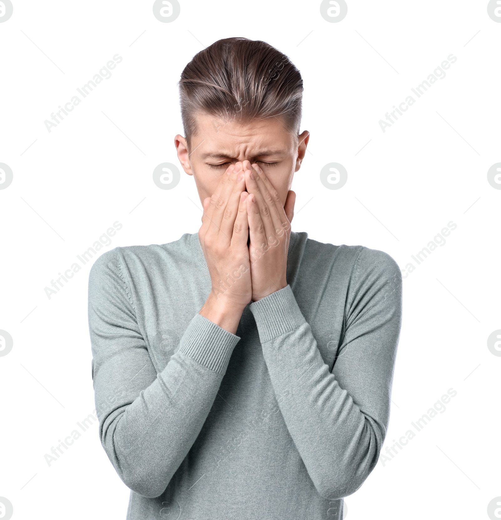 Photo of Young man suffering from sinusitis on white background