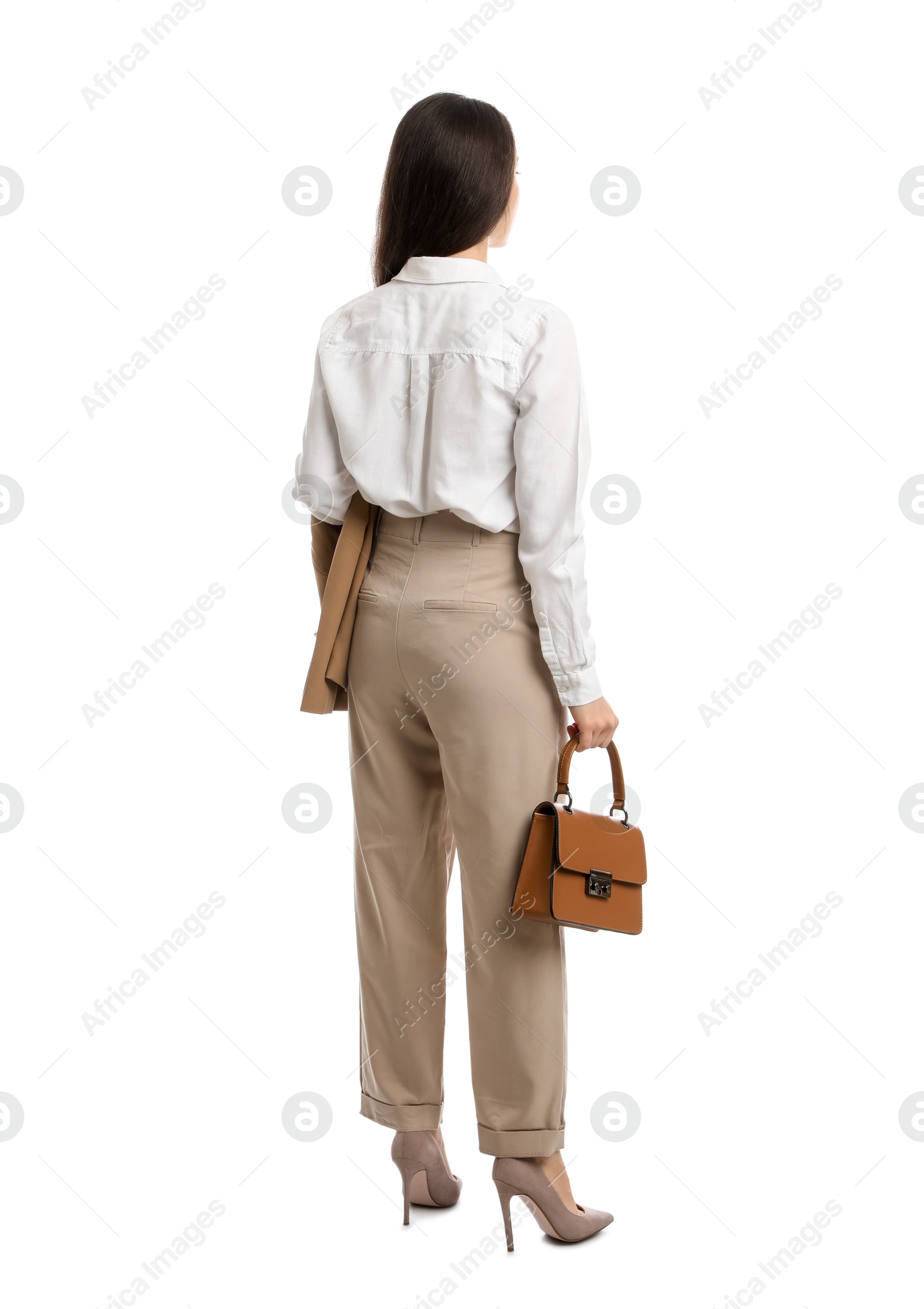 Photo of Young woman in business attire with bag on white background, back view