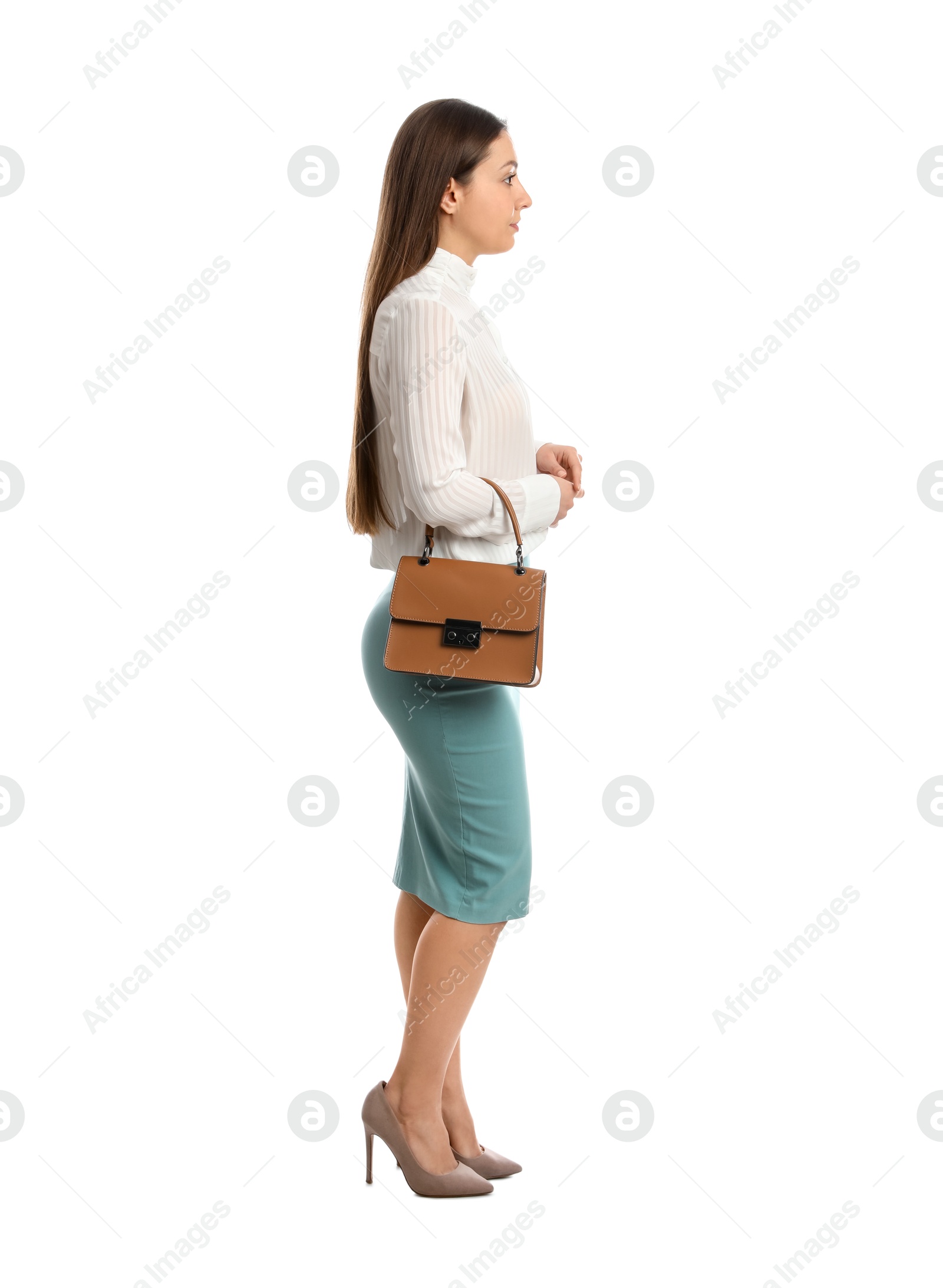 Photo of Young woman in business attire with bag on white background