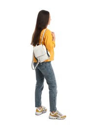 Photo of Young woman in casual clothes with backpack on white background, back view