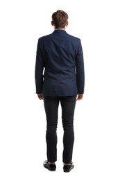 Young man in business attire on white background, back view