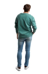 Photo of Young man in casual clothes on white background, back view