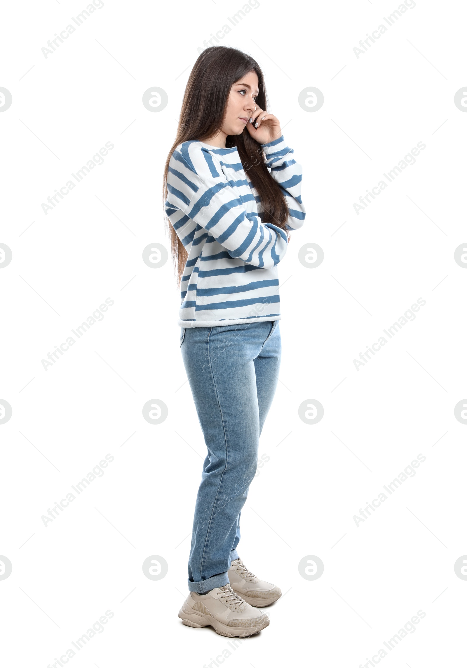 Photo of Young woman wearing casual clothes on white background