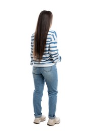 Young woman wearing casual clothes on white background, back view