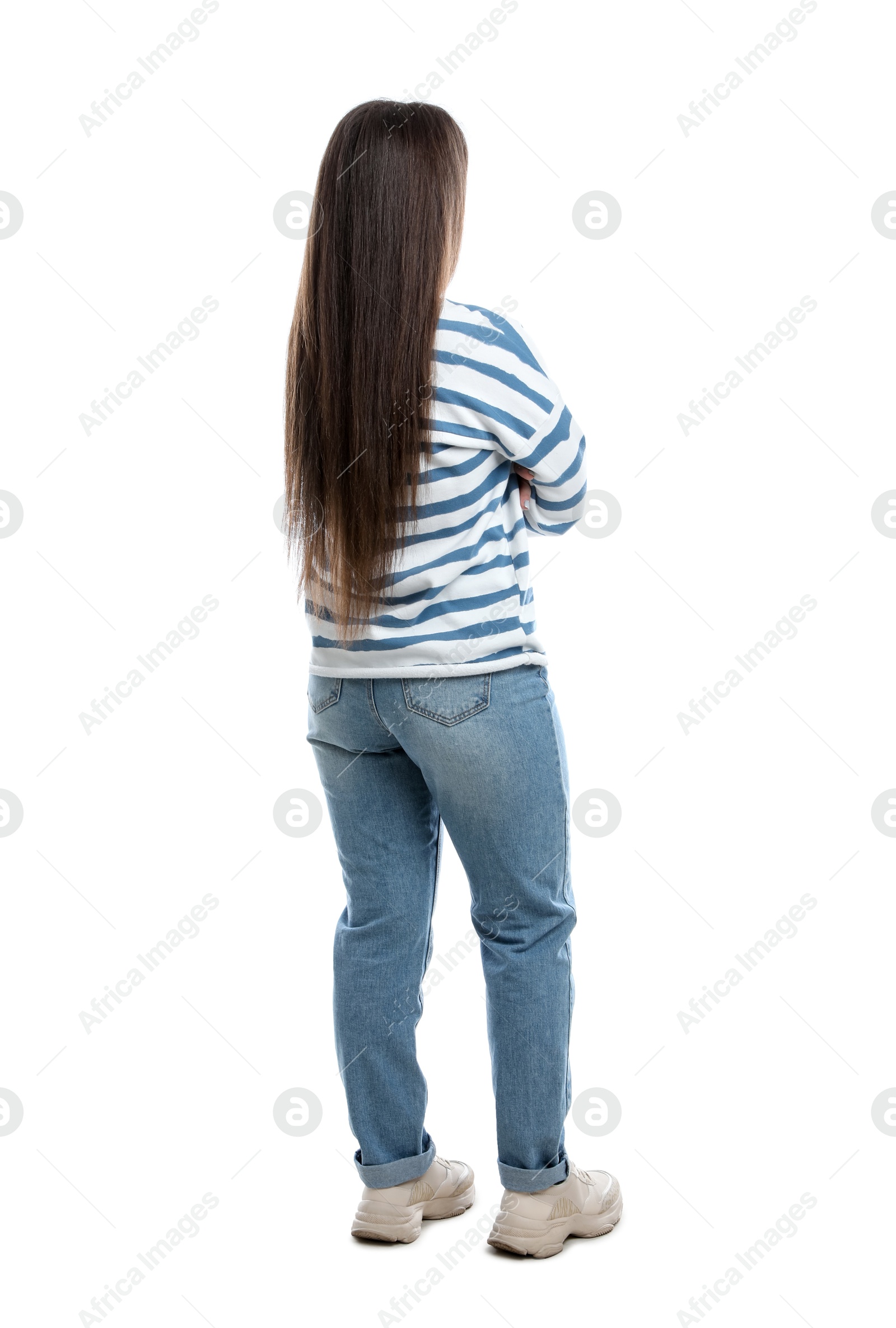 Photo of Young woman wearing casual clothes on white background, back view