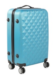 Photo of One light blue suitcase isolated on white