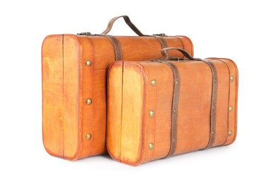 Photo of Two new wooden suitcases isolated on white