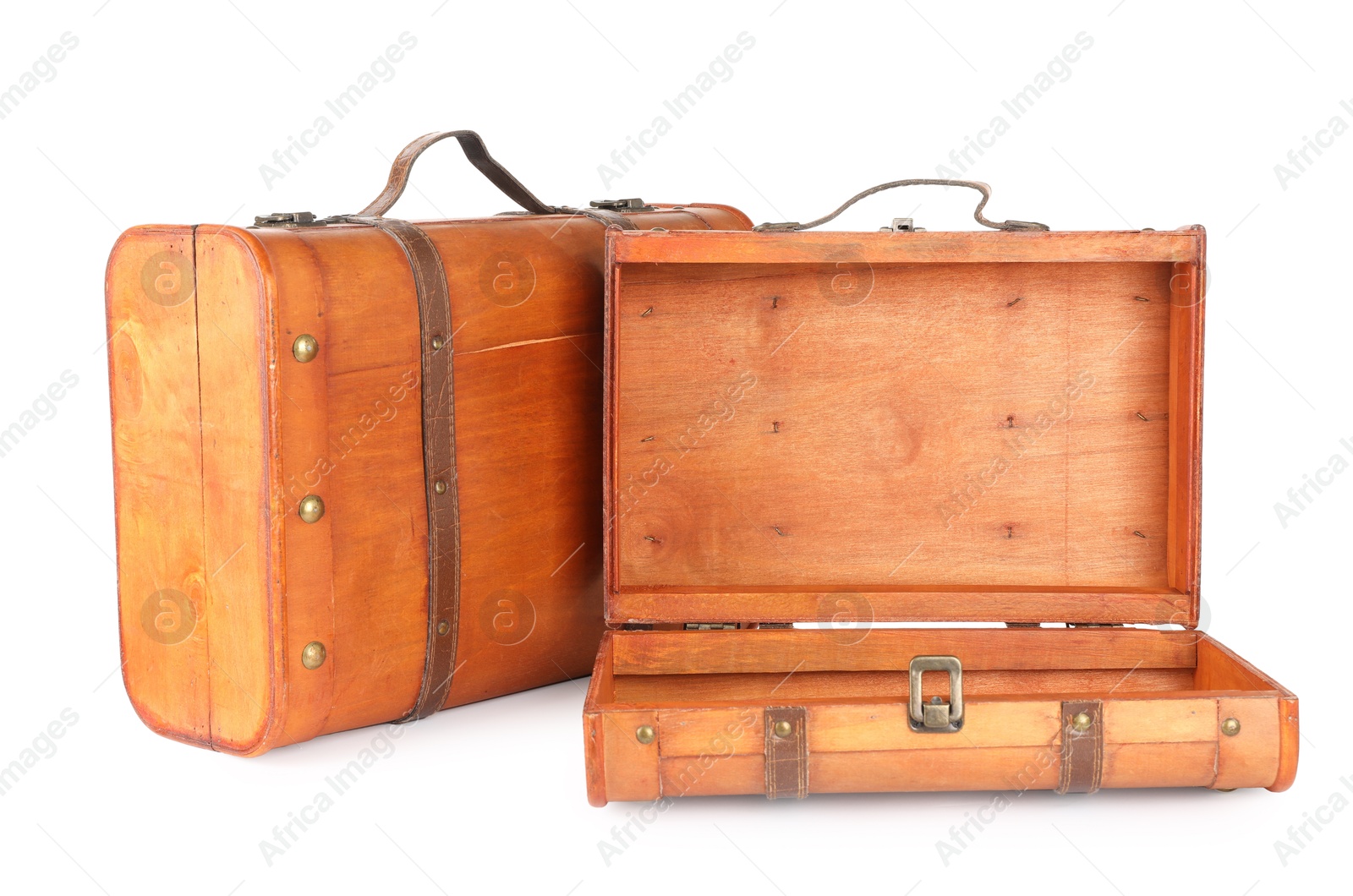 Photo of Two new wooden suitcases isolated on white