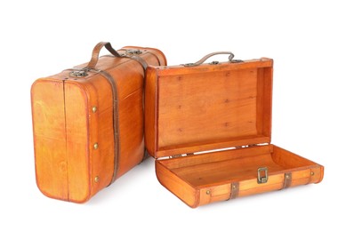 Two new wooden suitcases isolated on white