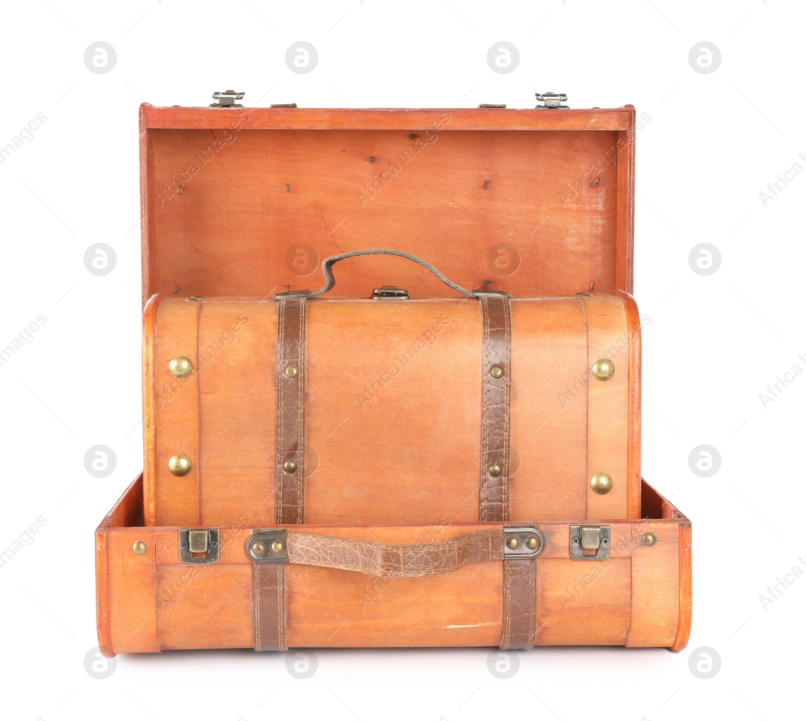 Photo of Three new wooden suitcases isolated on white