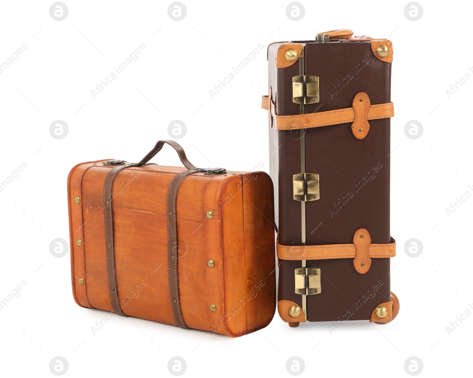 Photo of Two new brown suitcases isolated on white