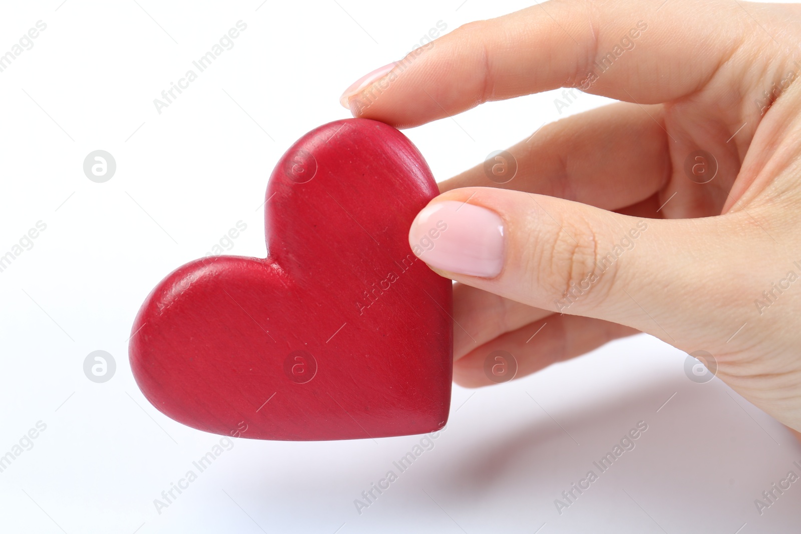 Photo of Woman holding red heart on white background, closeup