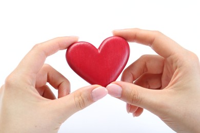 Photo of Woman holding red heart on white background, closeup