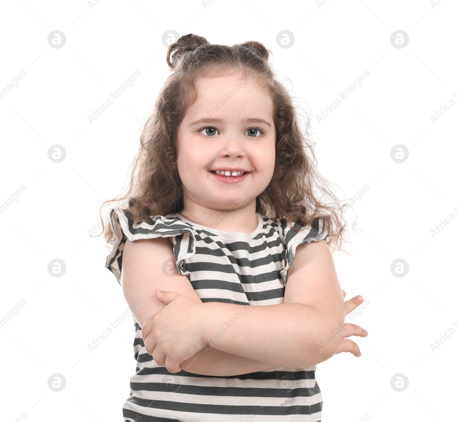 Photo of Portrait of smiling girl on white background. Adorable child