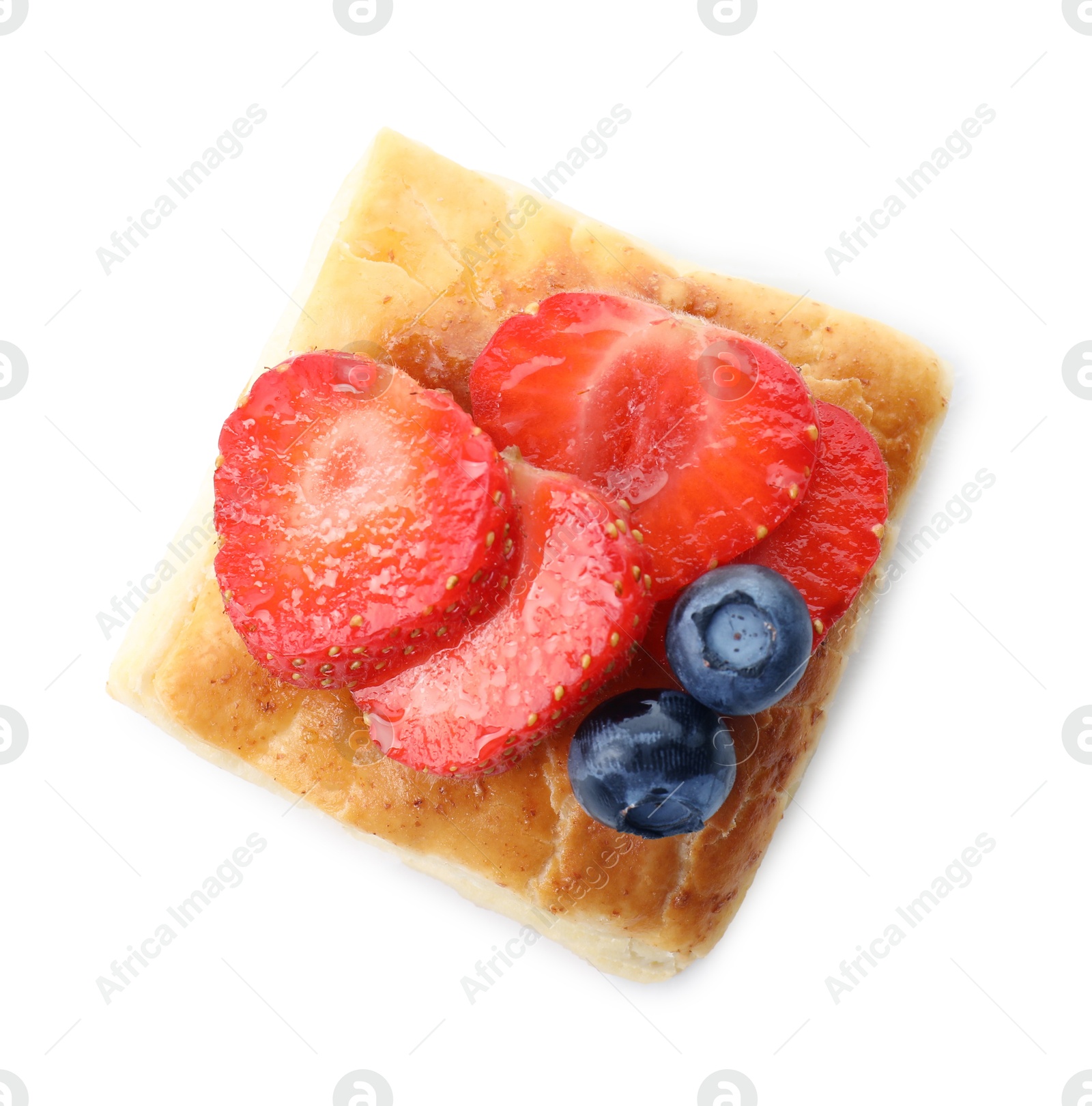 Photo of Tasty puff pastry with berries isolated on white, top view