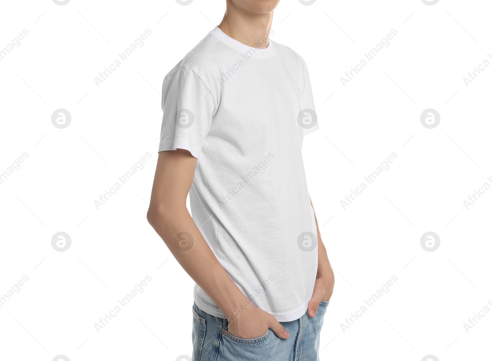 Photo of Teenage boy wearing t-shirt on white background, closeup