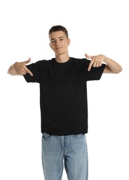 Teenage boy wearing black t-shirt on white background