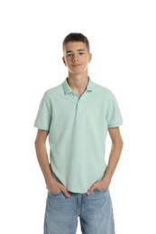 Teenage boy wearing light green t-shirt on white background