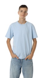 Teenage boy wearing light blue t-shirt on white background