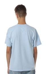 Photo of Teenage boy wearing light blue t-shirt on white background, back view