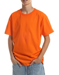 Photo of Teenage boy wearing orange t-shirt on white background, closeup