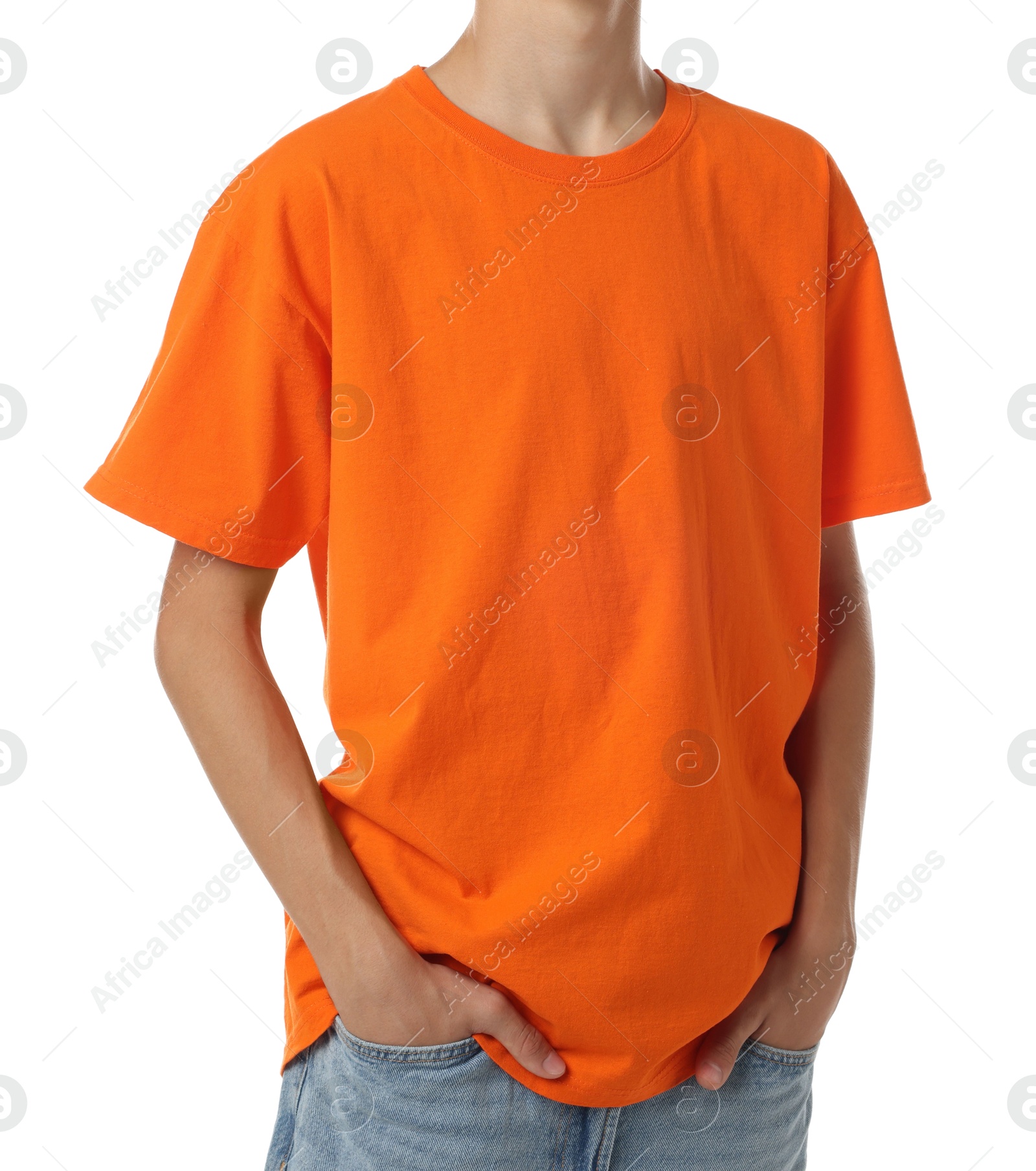 Photo of Teenage boy wearing orange t-shirt on white background, closeup