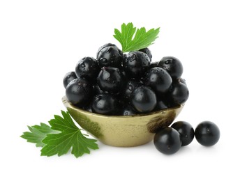 Photo of Fresh ripe black currant berries with leaves isolated on white