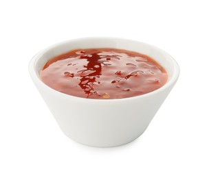 Photo of Hot chili sauce in bowl isolated on white