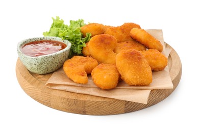 Photo of Board with hot chili sauce, lettuce and nuggets isolated on white