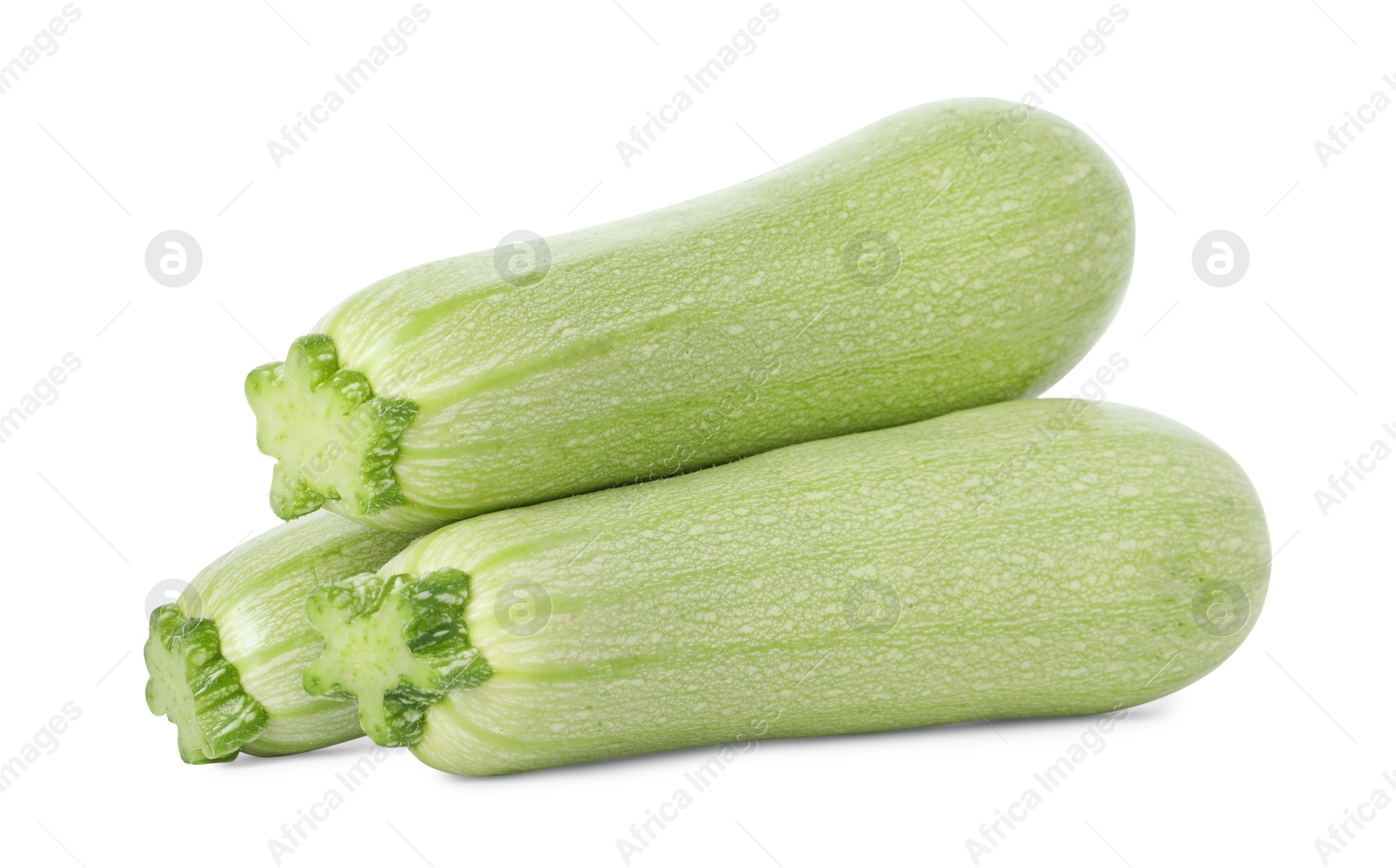 Photo of Many fresh ripe zucchinis isolated on white