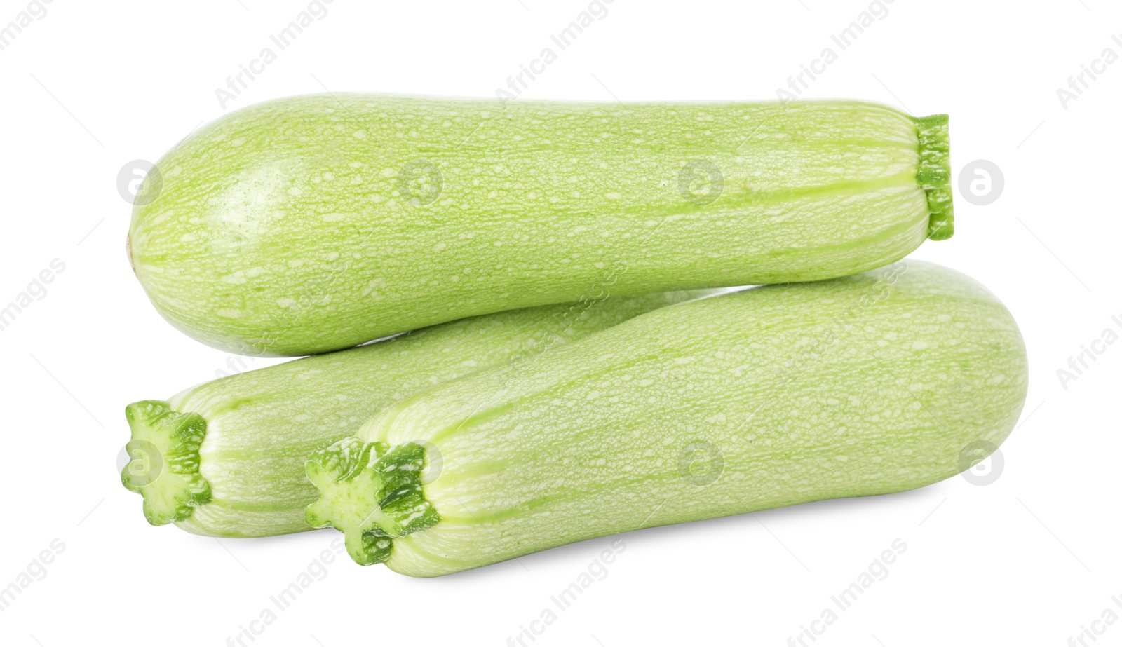 Photo of Many fresh ripe zucchinis isolated on white