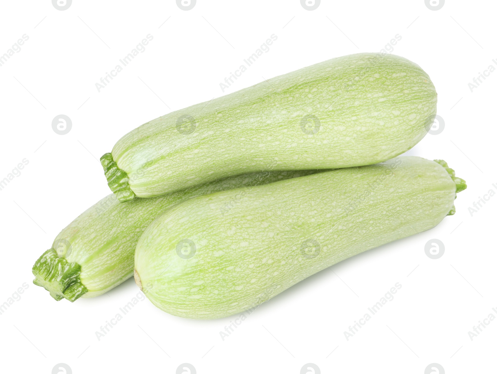 Photo of Many fresh ripe zucchinis isolated on white