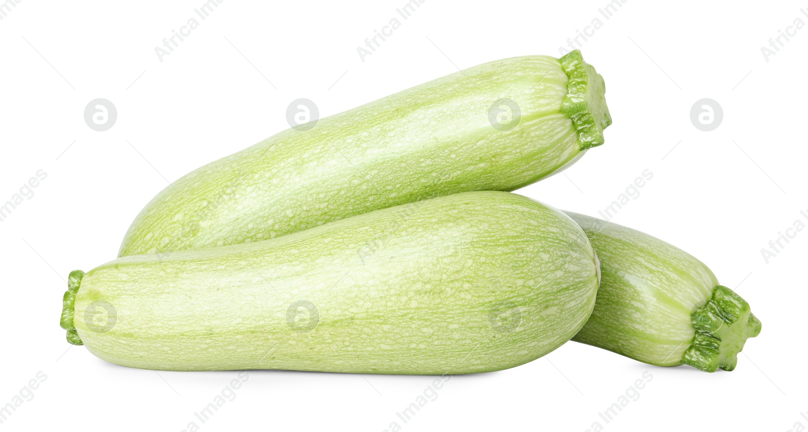 Photo of Many fresh ripe zucchinis isolated on white