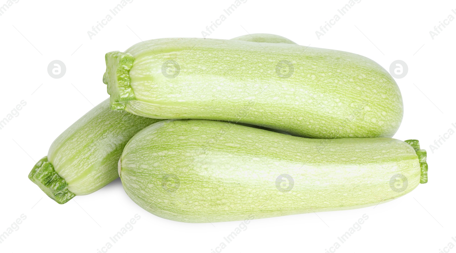 Photo of Many fresh ripe zucchinis isolated on white