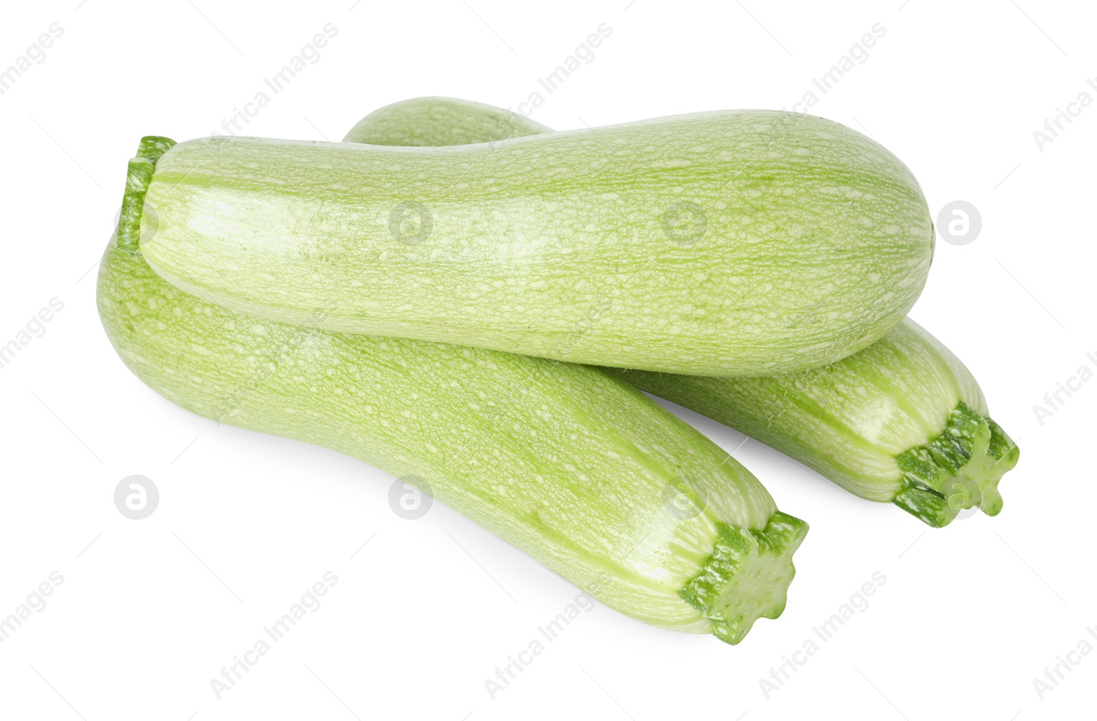 Photo of Many fresh ripe zucchinis isolated on white