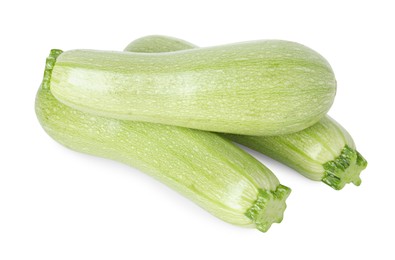 Photo of Many fresh ripe zucchinis isolated on white