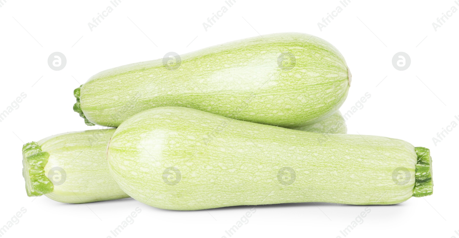 Photo of Many fresh ripe zucchinis isolated on white