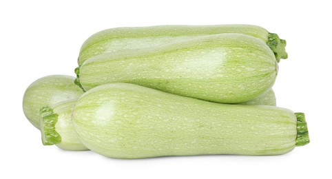 Photo of Many fresh ripe zucchinis isolated on white